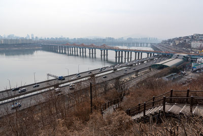 Bridge over river against sky