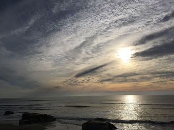 View of calm sea at sunset