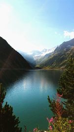 Scenic view of lake with mountains in background