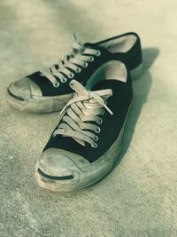 Close-up of shoes on floor