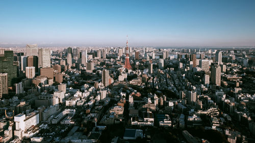 High angle view of modern buildings against clear sky
