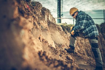 Engineer standing at construction site