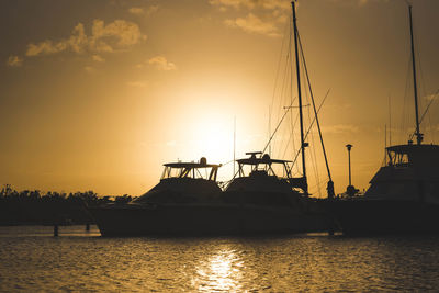 Silhouette of marina at sunset