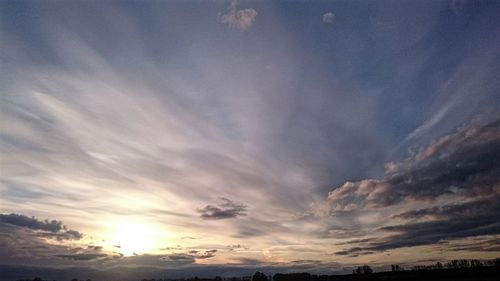 Low angle view of dramatic sky during sunset