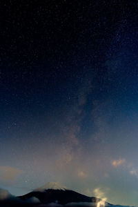 Low angle view of star field against sky at night