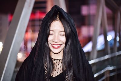 Close-up of smiling young woman