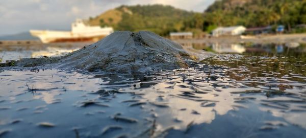 Surface level of water in sea against sky