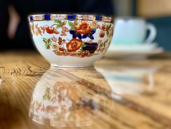 Close-up of glass of bowl on table