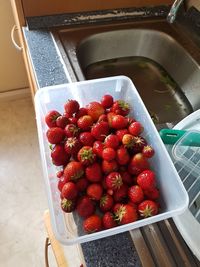 High angle view of strawberries in container