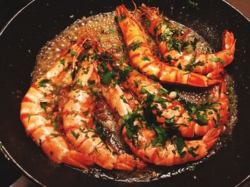 High angle view of prawns in frying pan