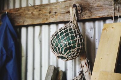 Close-up of clothes hanging on wood