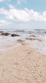 Scenic view of beach against sky