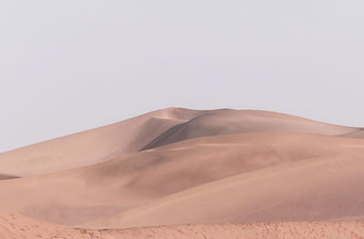 Scenic view of desert against clear sky