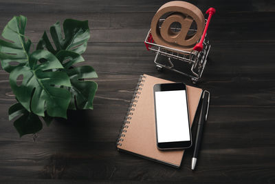 High angle view of smart phone on table