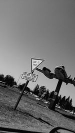 Basketball hoop at park against clear sky