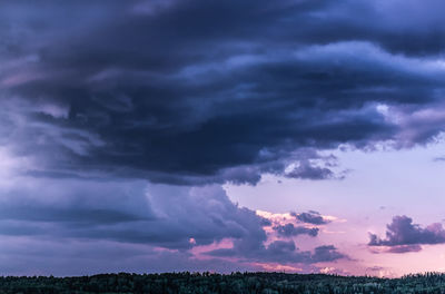 Storm clouds over landscape