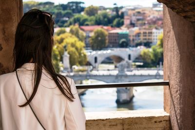 Close-up of woman standing in city