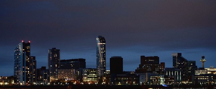 Illuminated cityscape at night