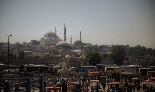 High angle view of buildings in city against sky
