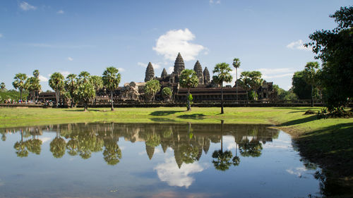 Reflection of trees in water, angkor wat in cambodia
