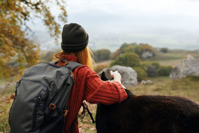 Rear view of woman wearing hat