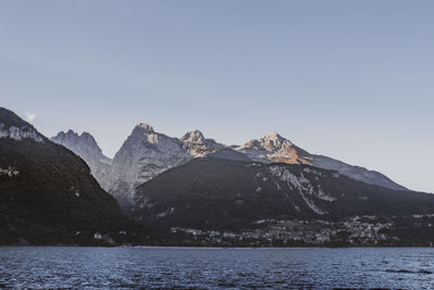 Scenic view of snowcapped mountains against clear sky