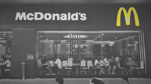 Group of people in front of building