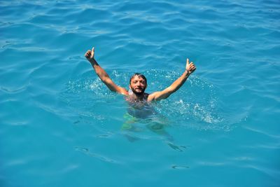 Woman swimming in pool