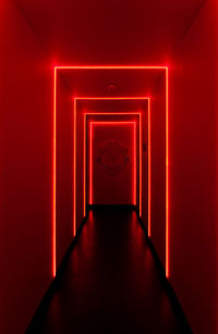 Illuminated corridor of red building