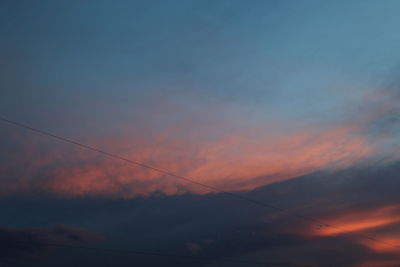 Low angle view of dramatic sky during sunset