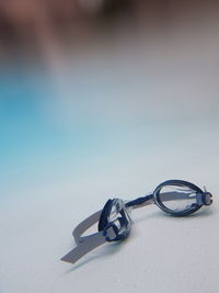 Close-up of goggles underwater in a pool