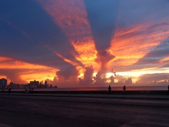 Scenic view of dramatic sky during sunset