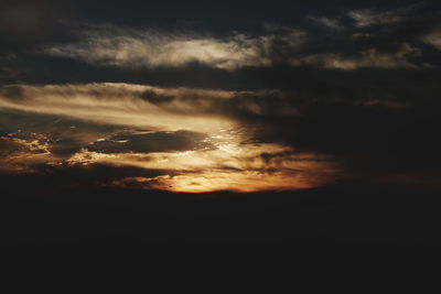 Low angle view of dramatic sky during sunset