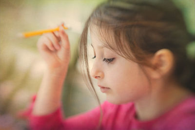 Close-up of girl looking down