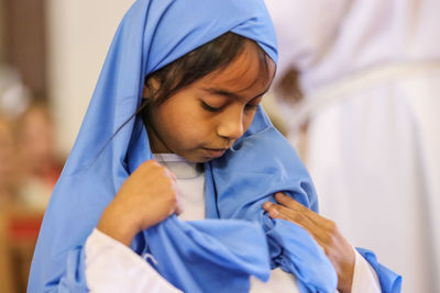 Close-up of girl in traditional clothing