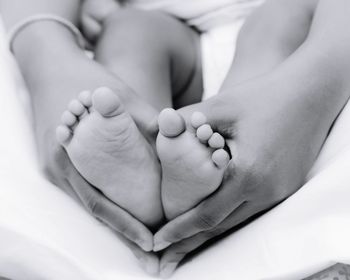 Low section of baby feet