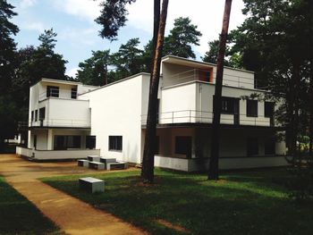 Built structure with trees in foreground