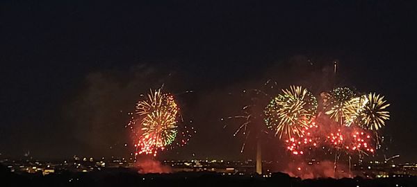 Firework display at night