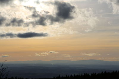 Scenic view of dramatic sky over landscape