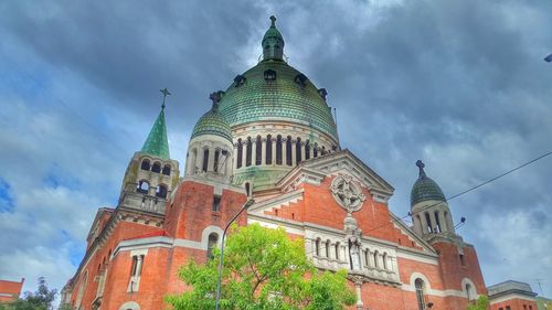 High section of church against cloudy sky