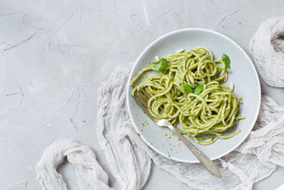 High angle view of pasta in plate on table