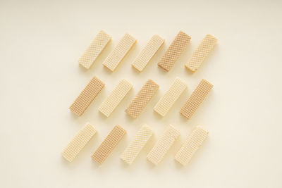 High angle view of bread in plate against white background