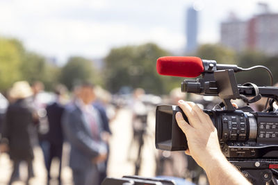 Filming media or press event with a video camera