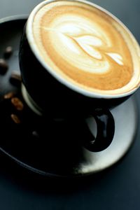 Close-up of cappuccino on table