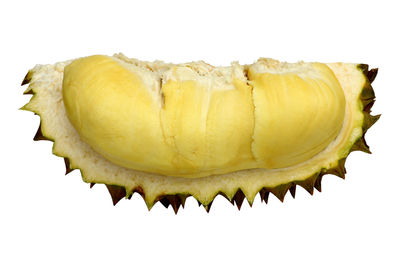 Close-up of lemon slice against white background