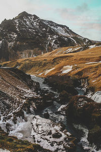 Scenic view of mountains against sky during winter