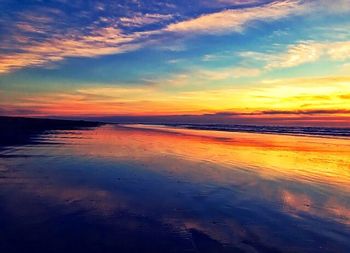 Scenic view of sea at sunset