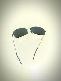 High angle view of sunglasses against white background