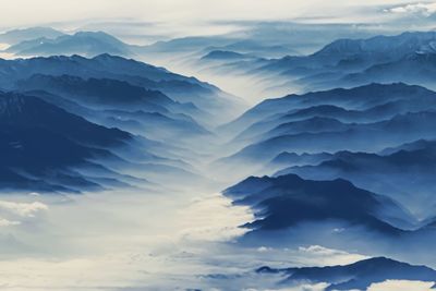 Scenic view of mountains against sky during sunset