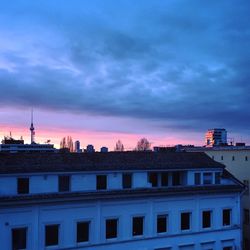 View of city against cloudy sky